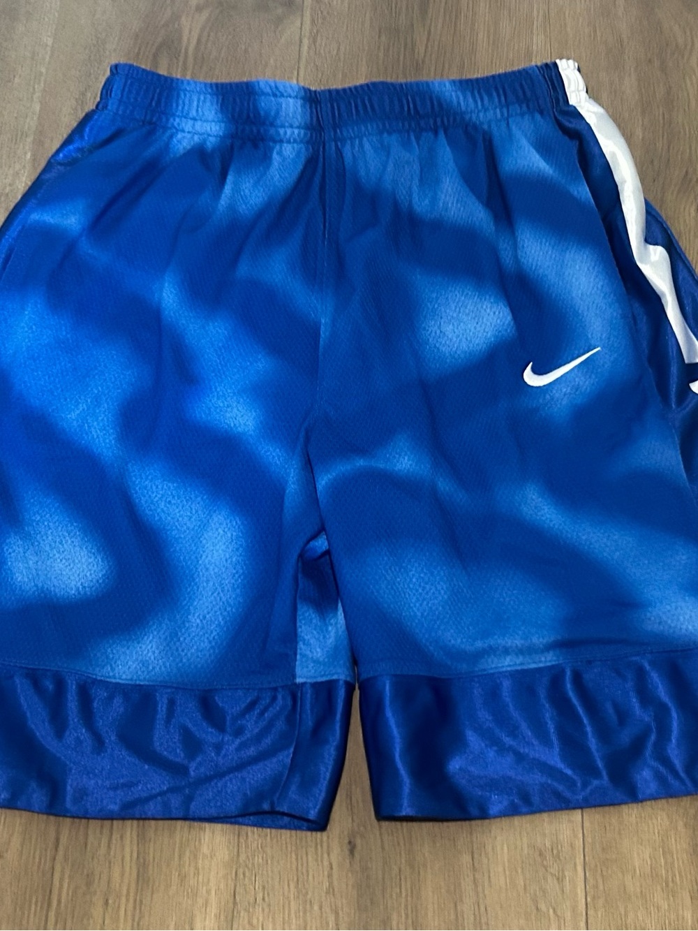 Kids Nike Blue Athletic Shorts with White Swoosh